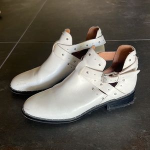 White leather buckle boots